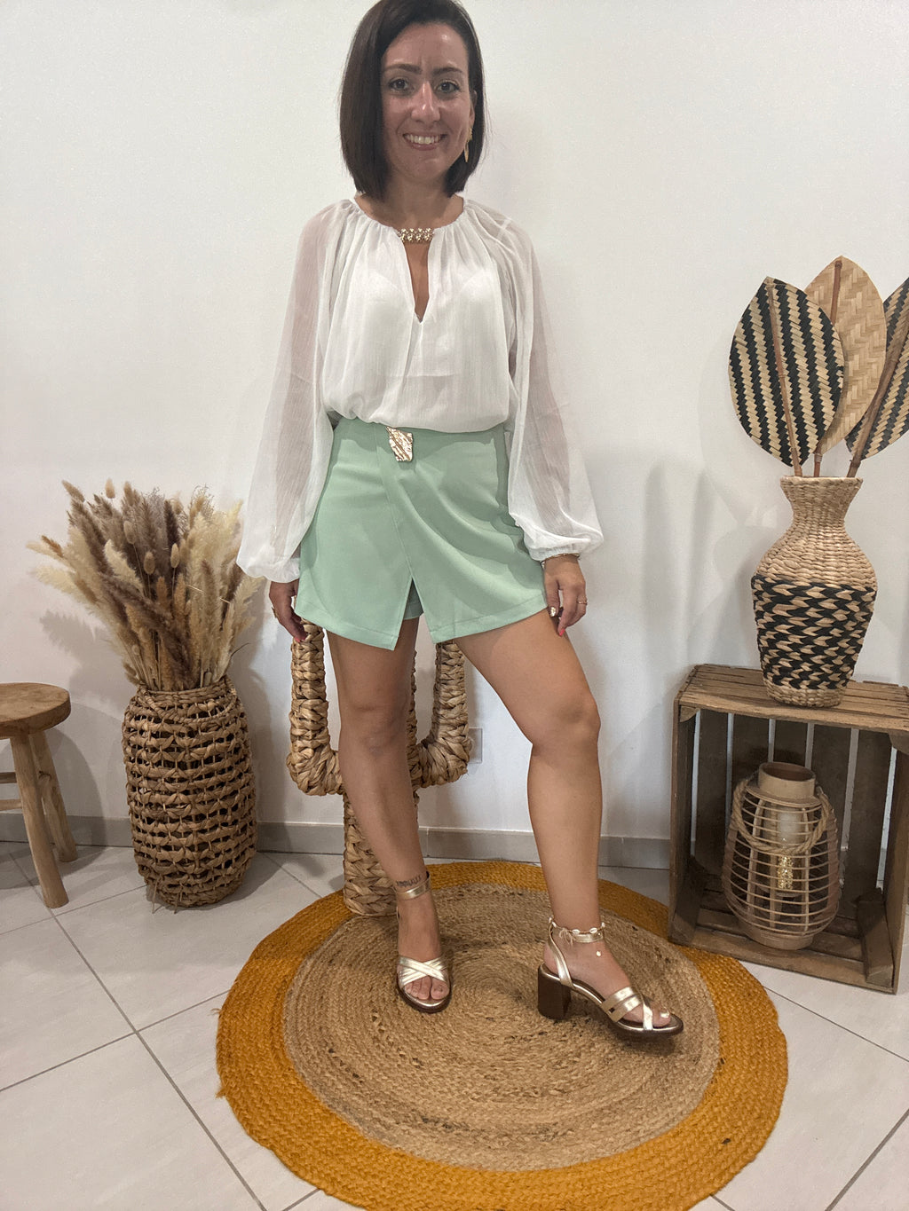 Jupe-short avec bijoux doré vert