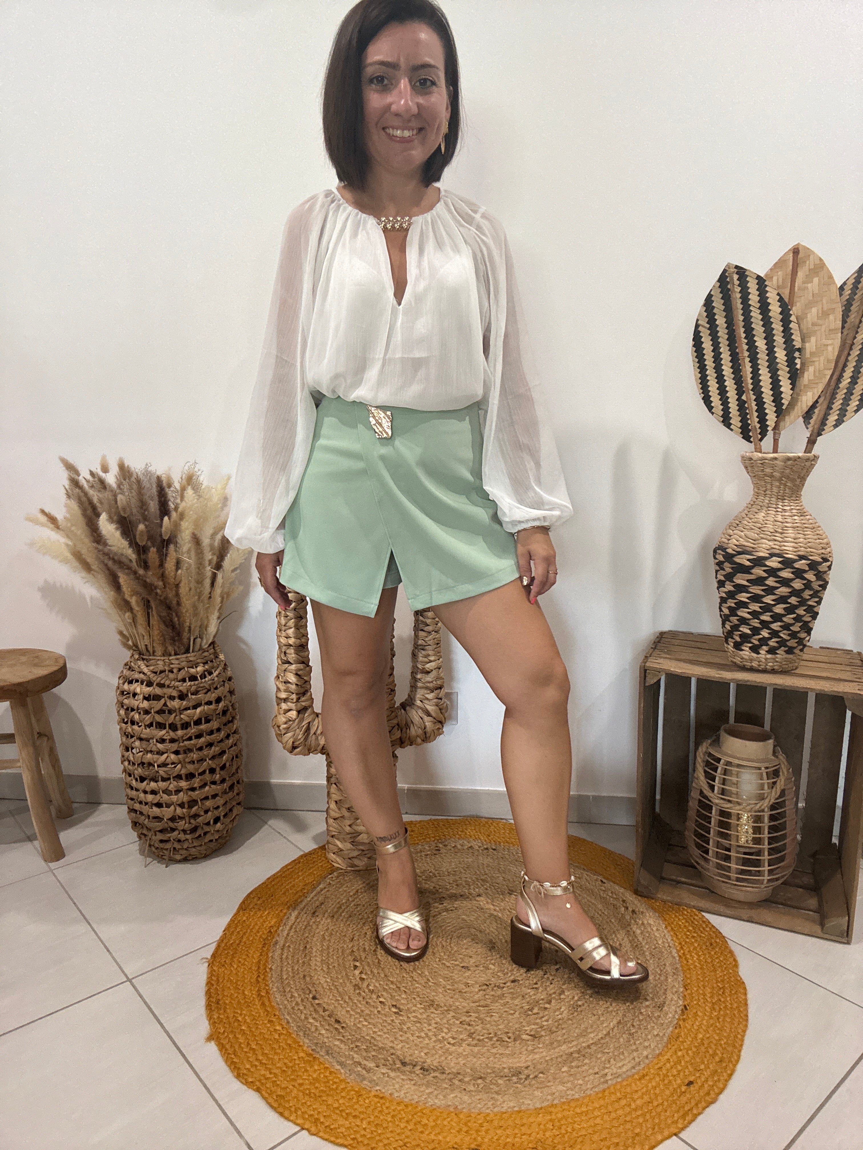 Jupe-short avec bijoux doré vert