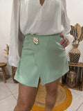 Jupe-short avec bijoux doré vert